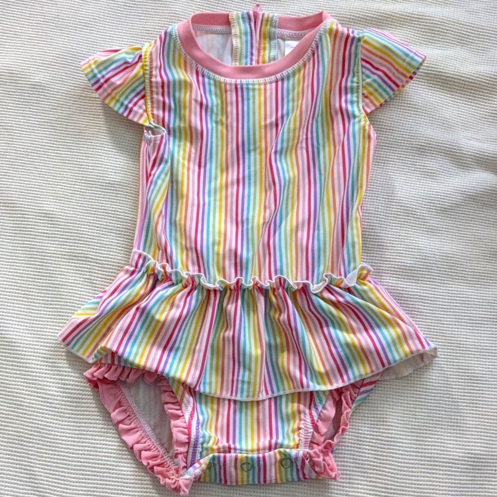 RuffleButts swim suit. Striped, skirted one piece.